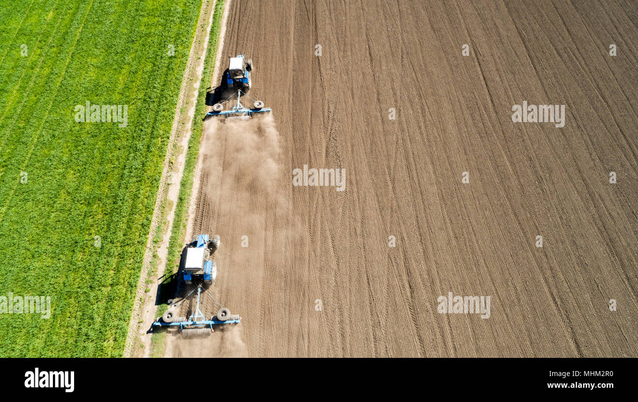 Aerial view of two tractors on a field Stock Photo Alamy