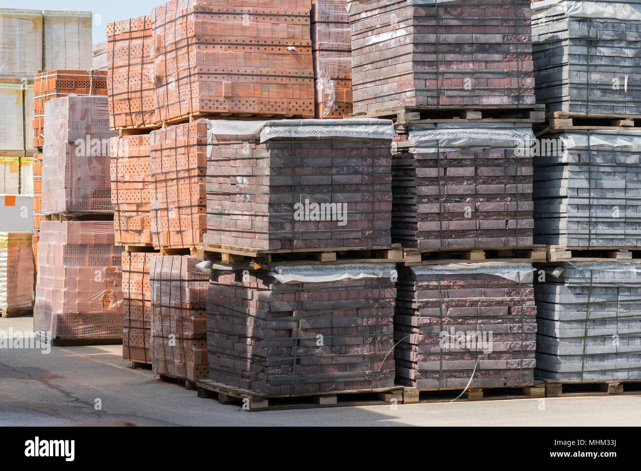 pallets with bricks in the building store. Racks with brick. Masonry ...