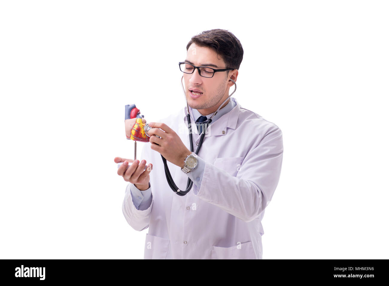 Young doctor with heart shape isolated on white Stock Photo - Alamy