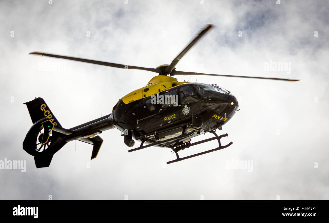 Police Helicopter circles Birling Gap, East Sussex Stock Photo