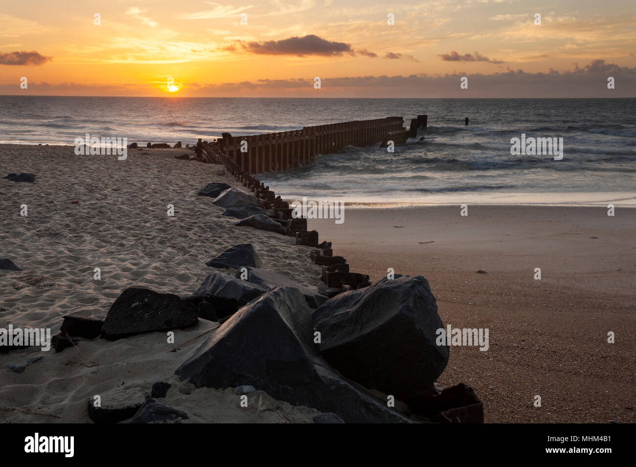 NC01614-00...NORTH CAROLINA - Sunrise from the beach at Cape Hatteras Lighthouse in Buxton on the Outer Banks, Cape Hatteras National Seashore. Stock Photo