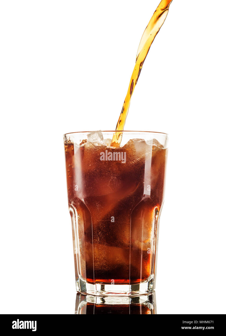 Cola in glass with straw and ice cubes isolated on white background Stock Photo