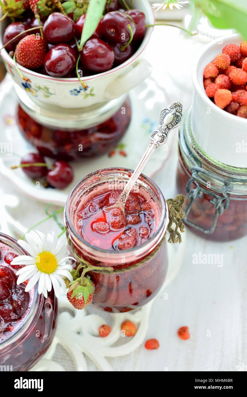 Still life with various types of jam Stock Photo Alamy