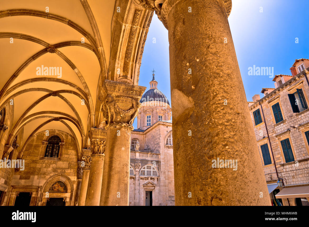 Dubrovnik street historic architecture and arches view, the Assumption Cathedral, Dalmatia region of Croatia Stock Photo