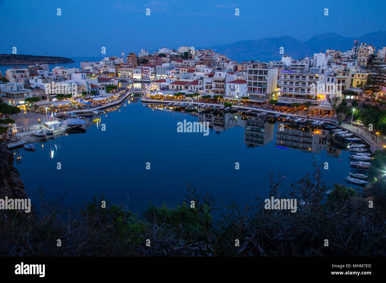 Agios Nikolaos city at night - blue hour Stock Photo