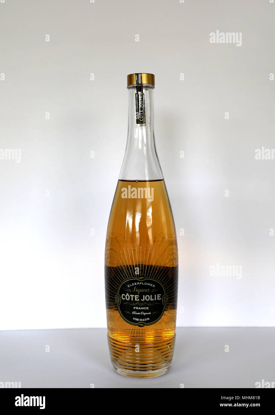 Cote Jolie Elderflower Liqueur Product Of France 20% Alcohol Bottle on White Background Stock Photo