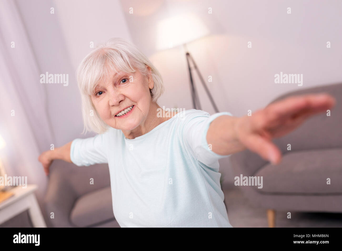 Happy old woman spread hi-res stock photography and images - Alamy