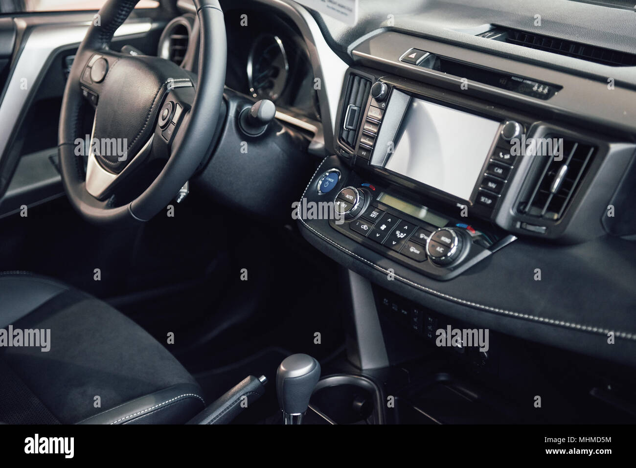 Luxury car Interior steering wheel, shift lever, dashboard and