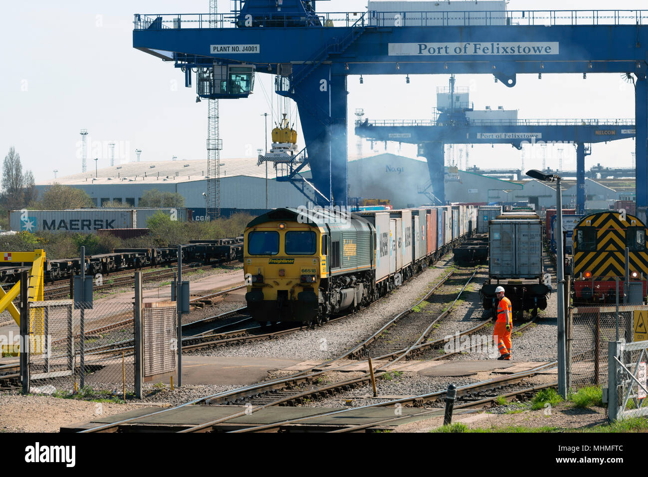 Freightliner cargo train departing the North rail terminal, Port of Felixstowe, Suffolk, UK. Stock Photo