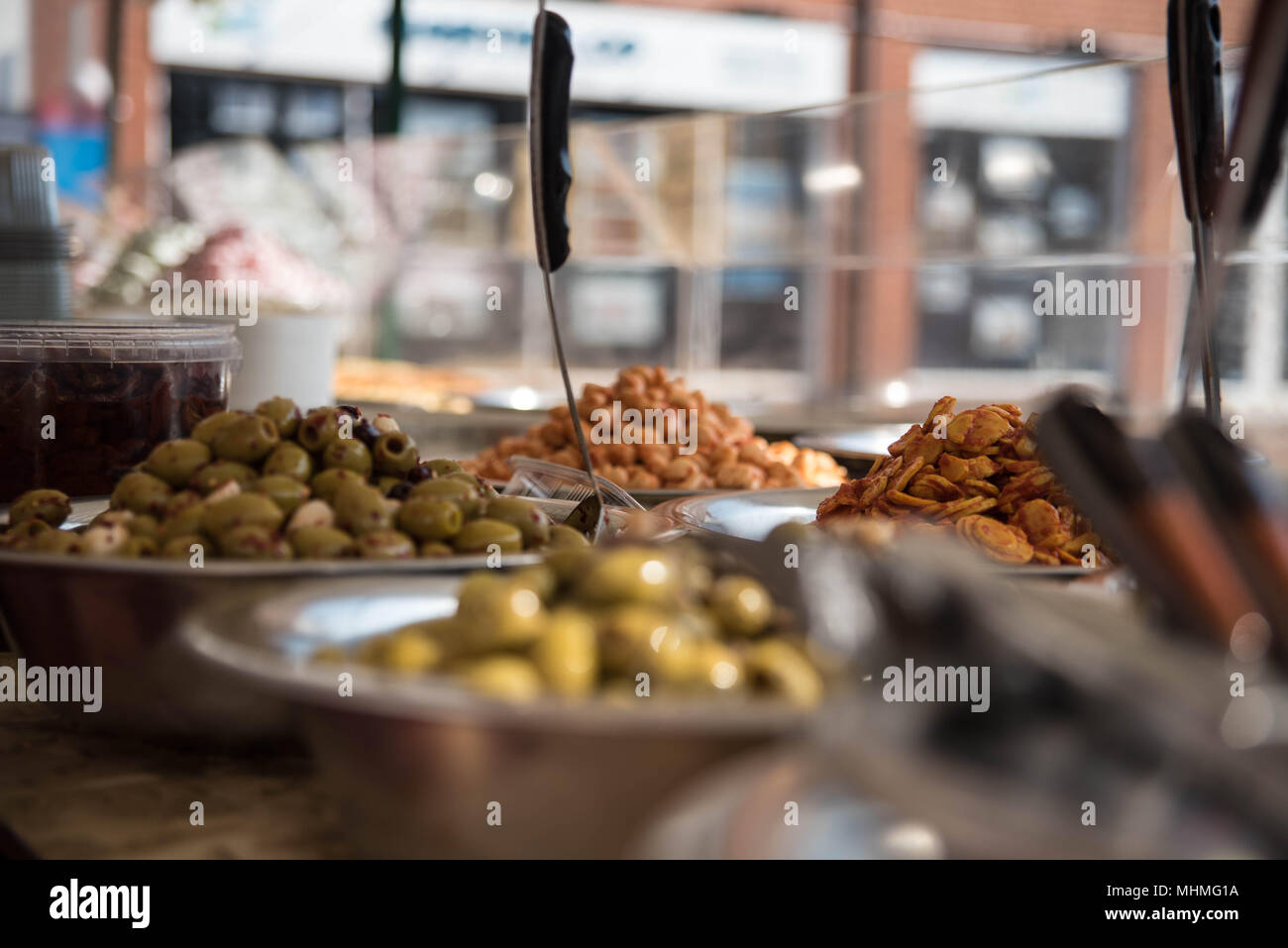 Olives for sale in stalls at Taste of Spring food fair in Banbury, Oxfordshire, on April 22, 2018 Stock Photo