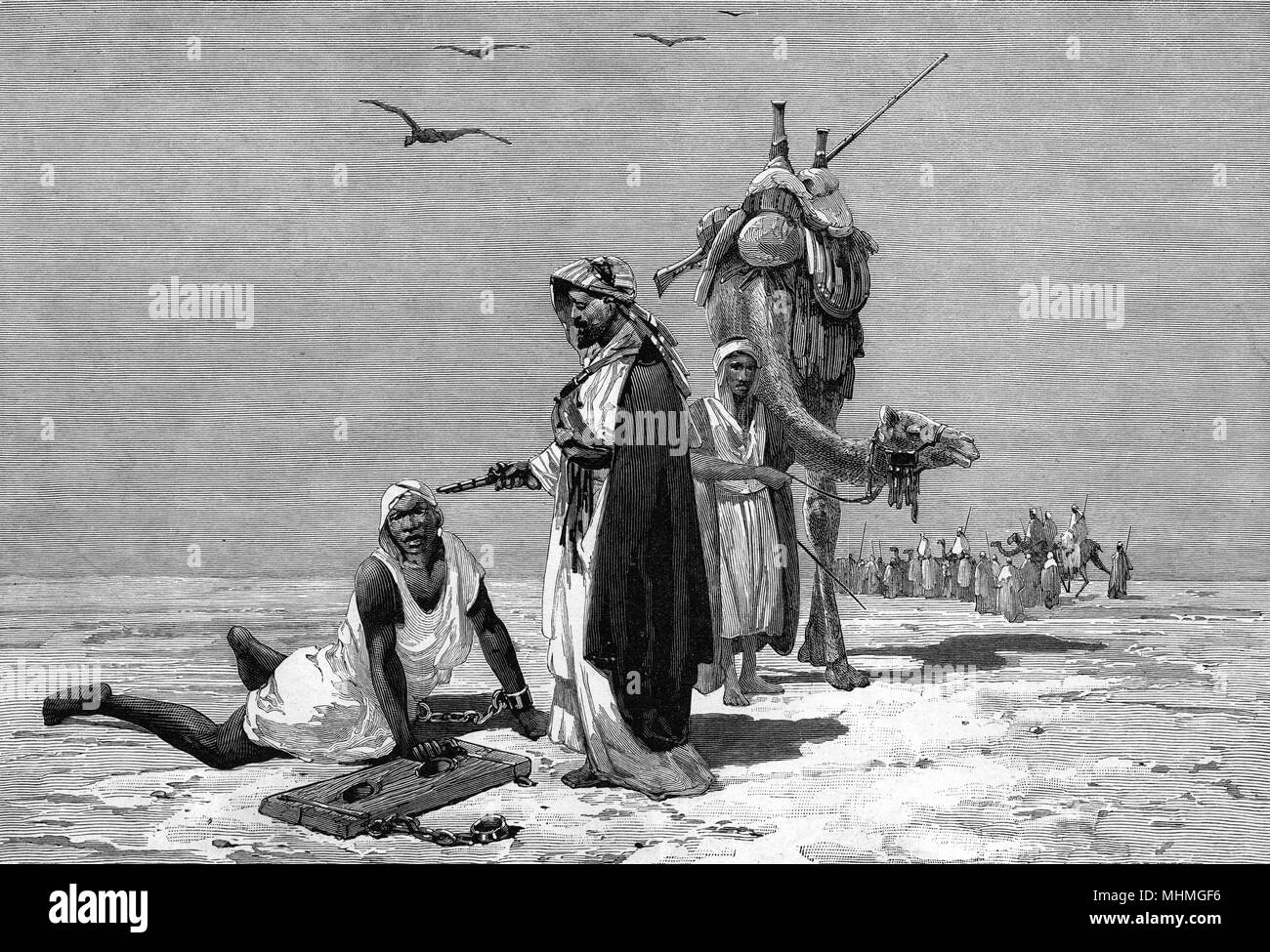 EAST AFRICA A trader gives the coup de grace to an exhausted slave       Date: 1884 Stock Photo