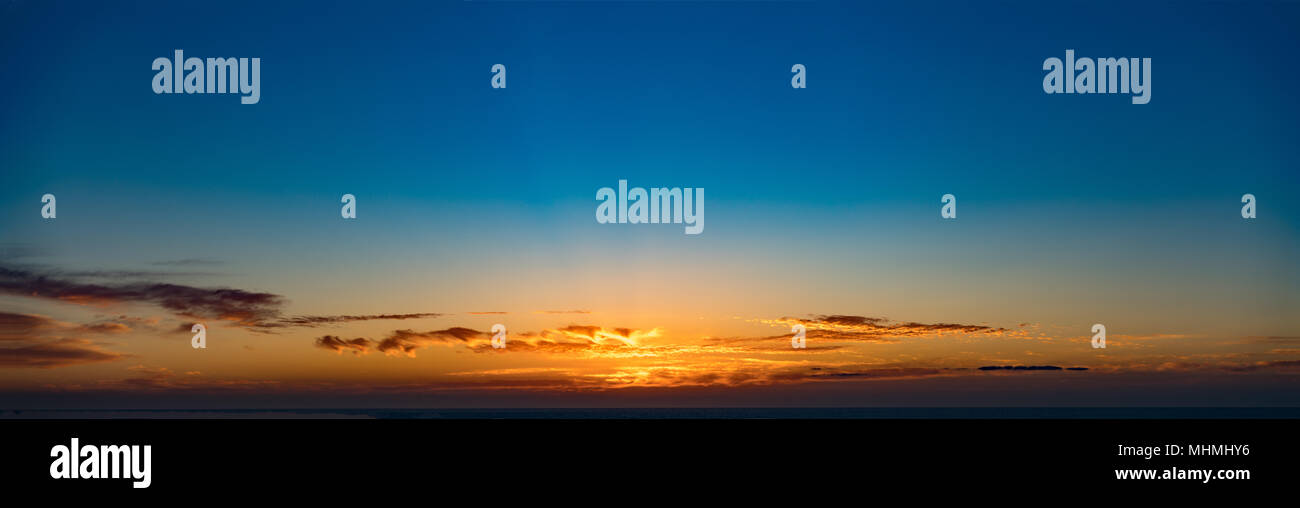 Dramatic sunset sky with clouds Stock Photo - Alamy