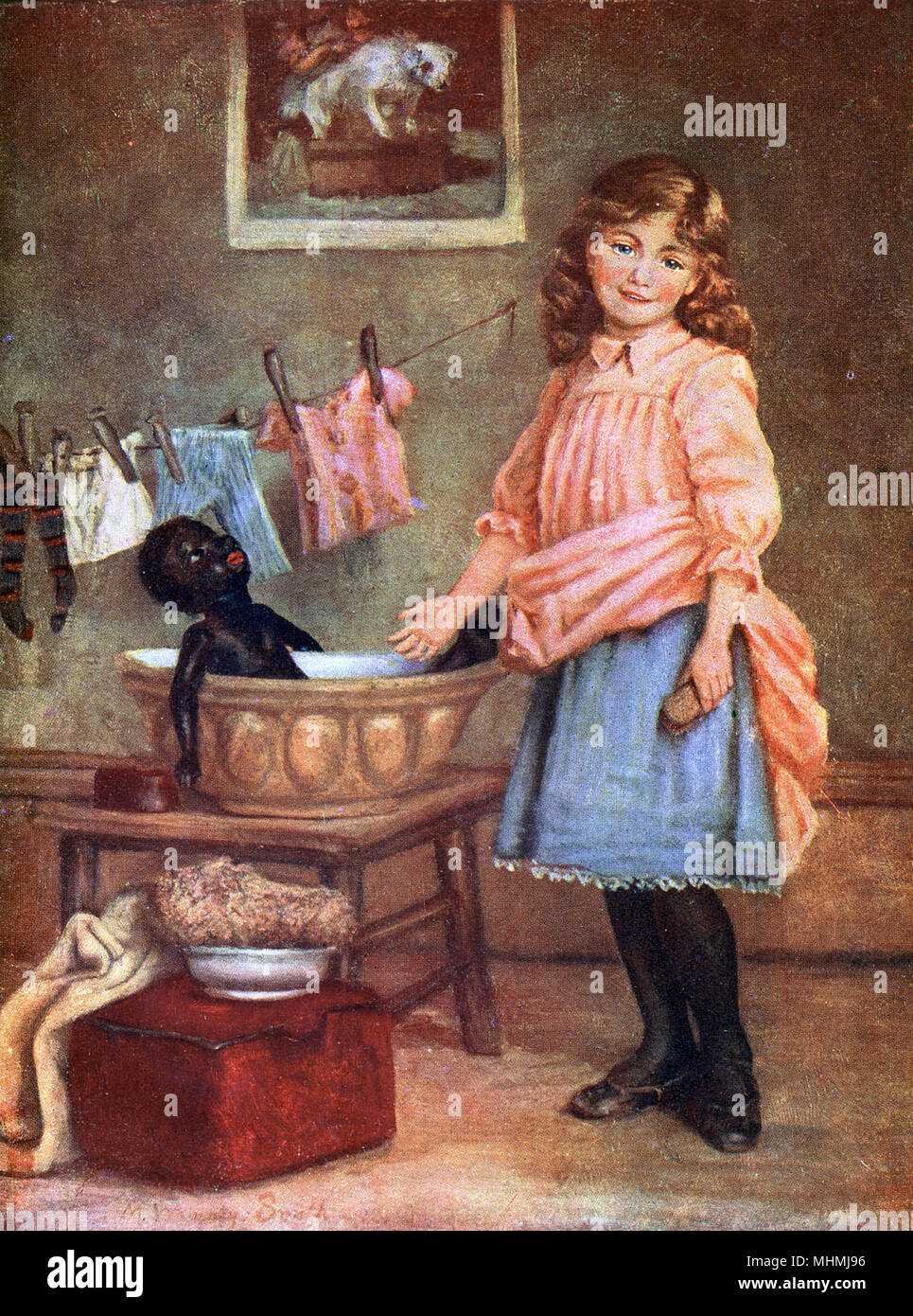 'What shall I do with him ?' a girl and her golliwog       Date: early 20th century Stock Photo