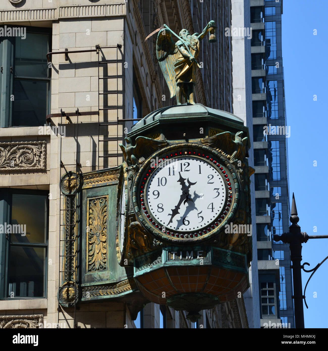 The 1926 'Father Time' clock located outside the Jeweler's Building in Chicago's downtown Loop business district. Stock Photo