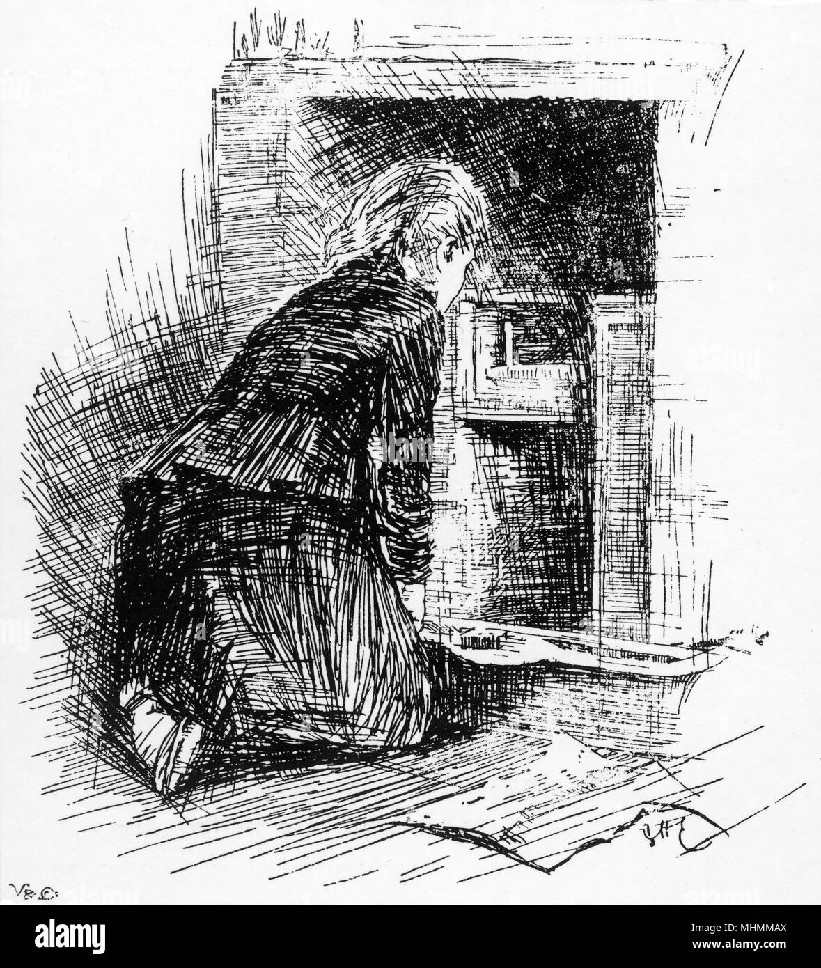 A woman, perhaps a maid, lights a fire in the grate early in the morning       Date: 1895 Stock Photo