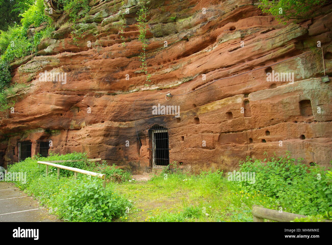 A house in the rock at Wolverley in Worcestershire, hewn out of the sandstone hillside near the River Severn.  Several of these cave houses were built in the area in the late 18th century.  In 2000 one of the rock houses was put on the property market for ú10,000.  It was carpeted, but had no electricity, running water or toilet facilities. Stock Photo