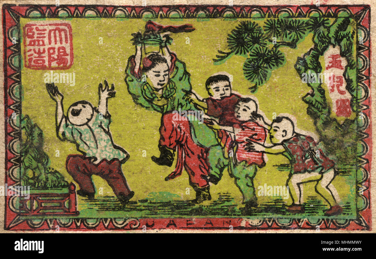 Old Japanese Matchbox label with children playing Stock Photo