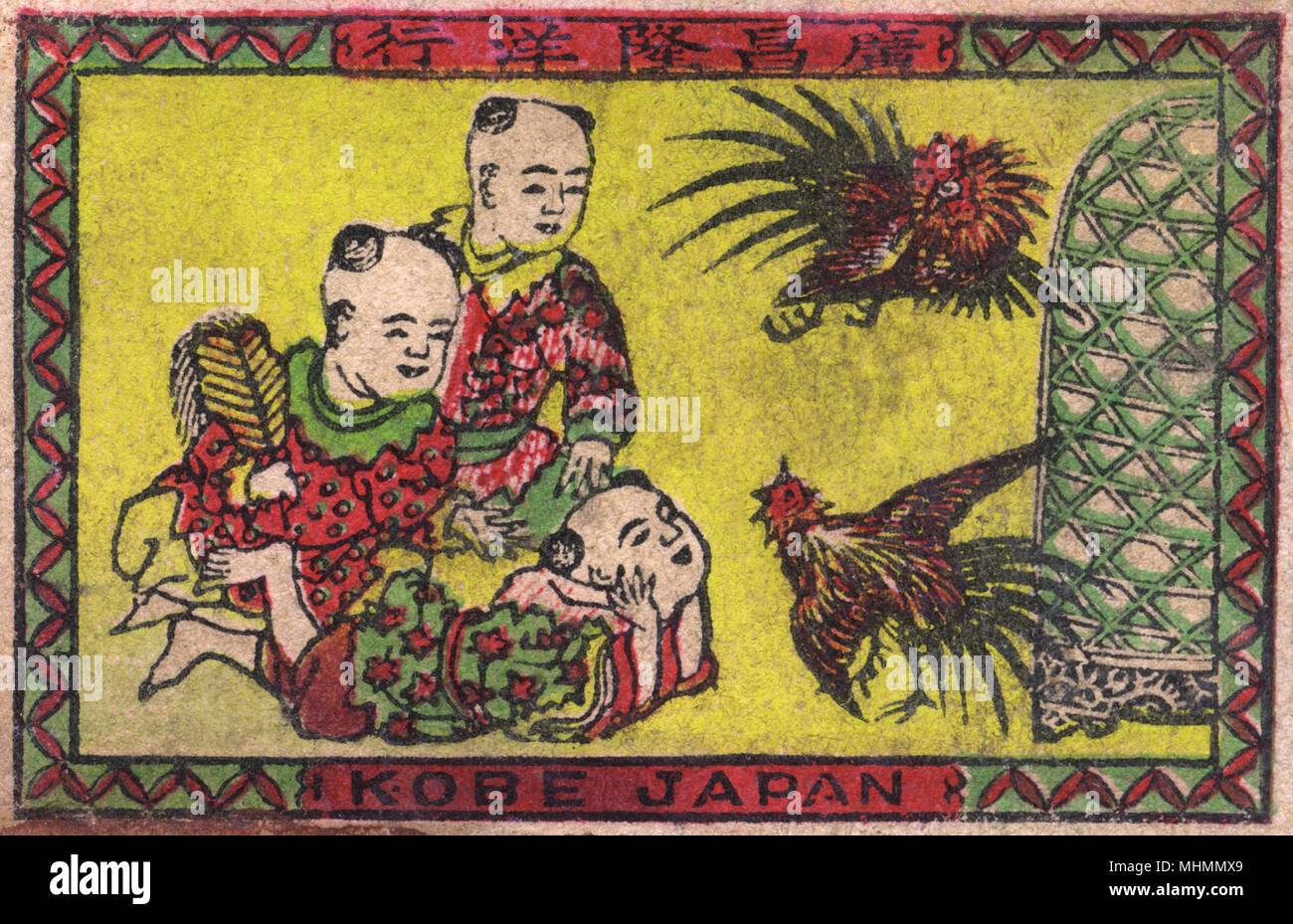 Old Japanese Matchbox label with three men watching chickens Stock Photo