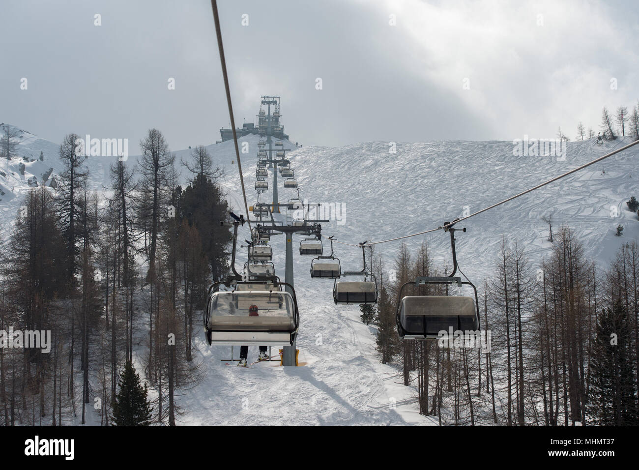 Chair Lift for skiers in winter snow time Stock Photo - Alamy