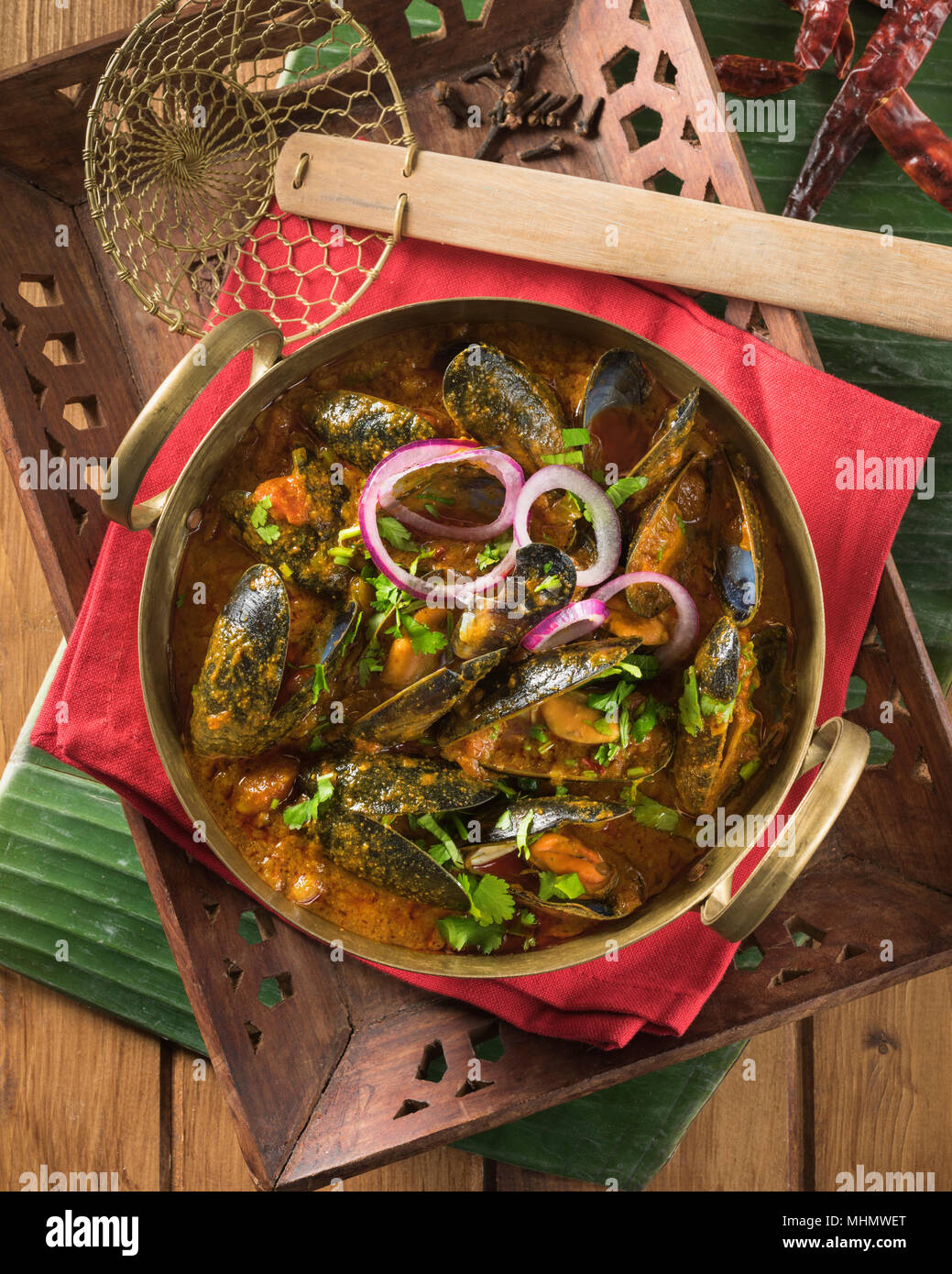Mussels masala. Shellfish curry. India Food Stock Photo - Alamy
