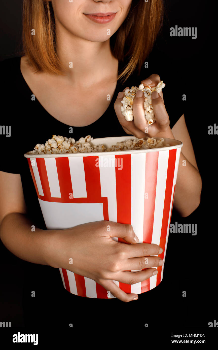 Woman With Bucket Of Popcorn Stock Photo Alamy woman-with-bucket-of-popcorn-stock-photo-alamy