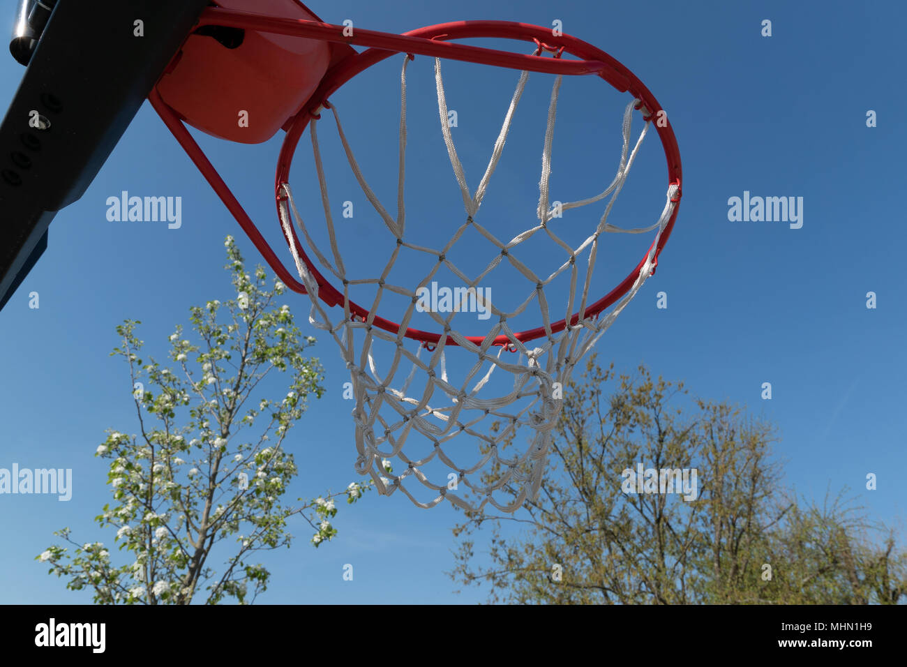 Basketball hoop photographed from below Stock Photo