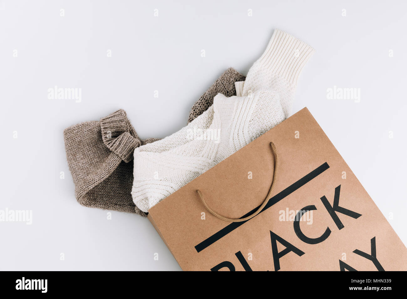clothes in shopping bag Stock Photo Alamy