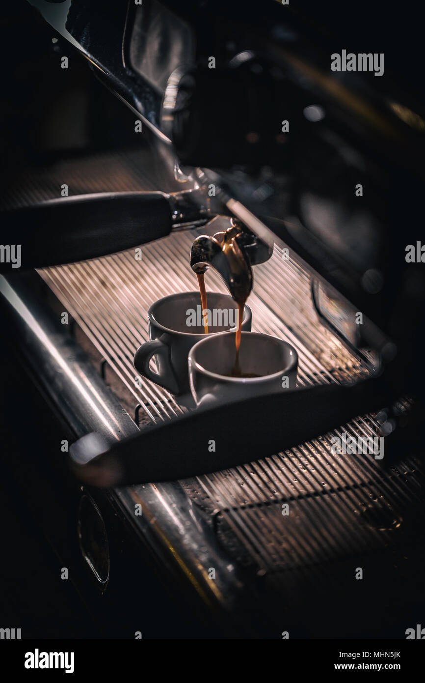 Coffee machine makes two coffee Stock Photo Alamy