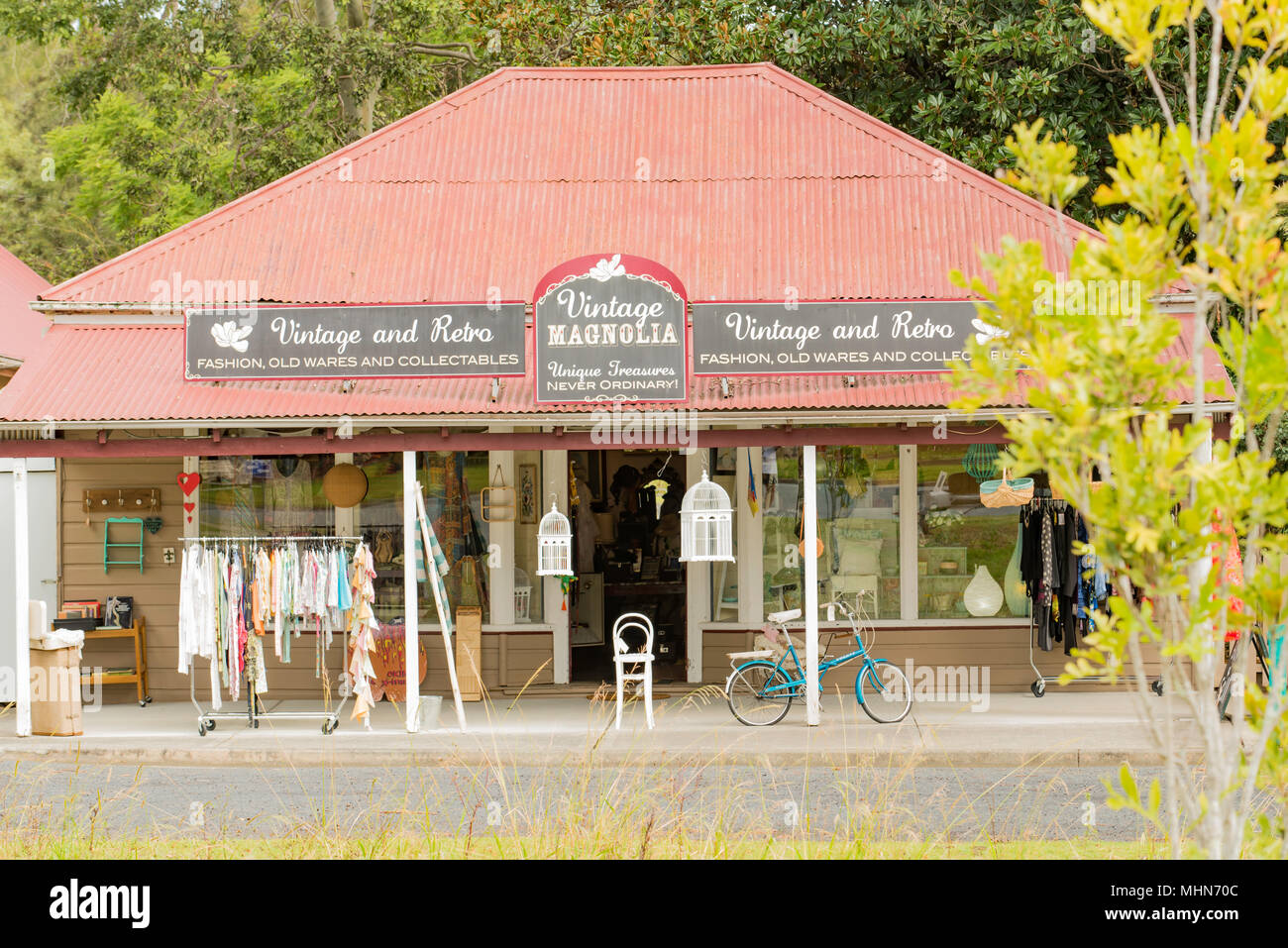 A vintage clothing and collectibles shop with a traditional corrugate