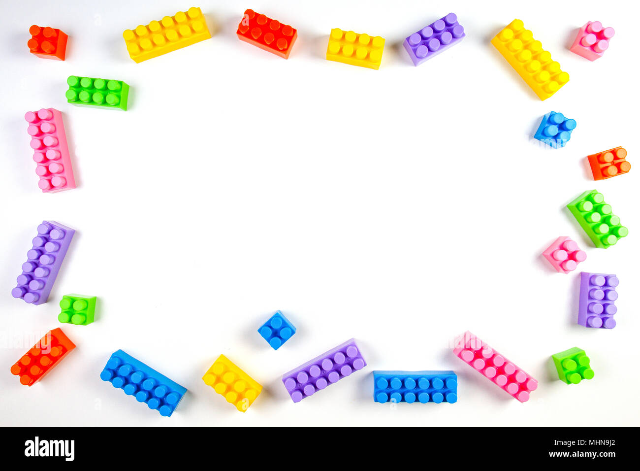 Colorful plastic construction blocks on white background as kids toys ...