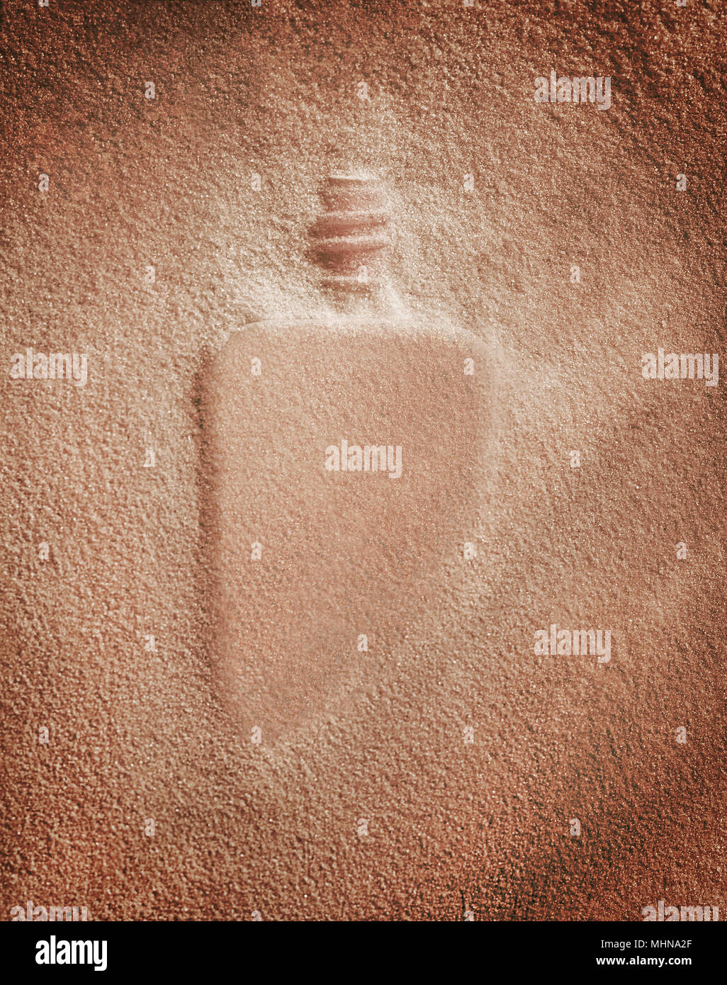Abstract glass bottle silhouette in raw glass material. Stock Photo