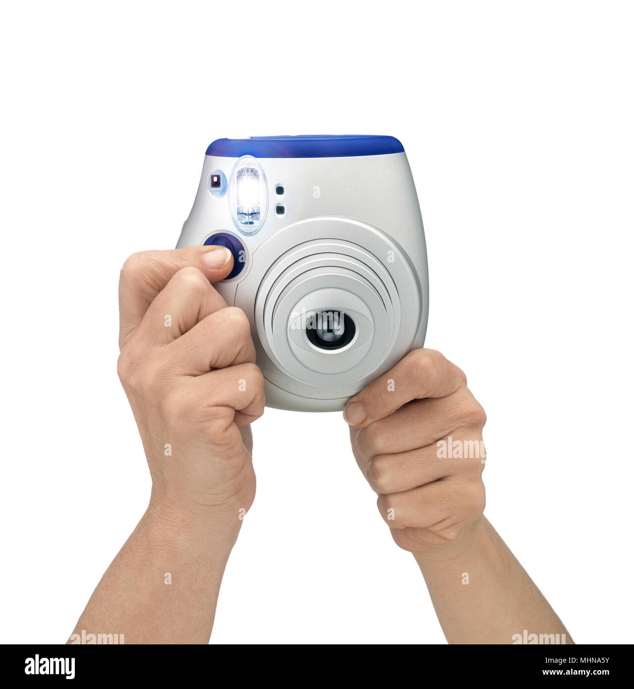 Hands Holding instant camera on white background. flashing shot. Clipping path Stock Photo