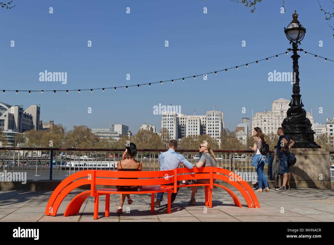 LONDON, GREAT BRITAIN, April 20, 2018 : Crowd on South Bank on a springtime day. South Bank is an entertainment and commercial district, next to the R Stock Photo