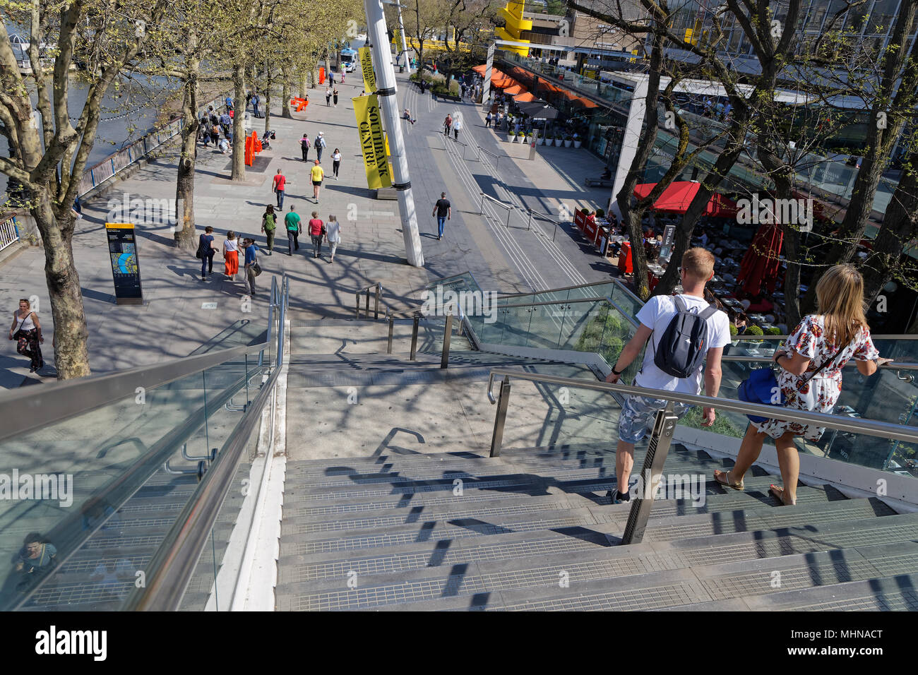 LONDON, GREAT BRITAIN, April 20, 2018 : Crowd on South Bank on a springtime day. South Bank is an entertainment and commercial district, next to the R Stock Photo