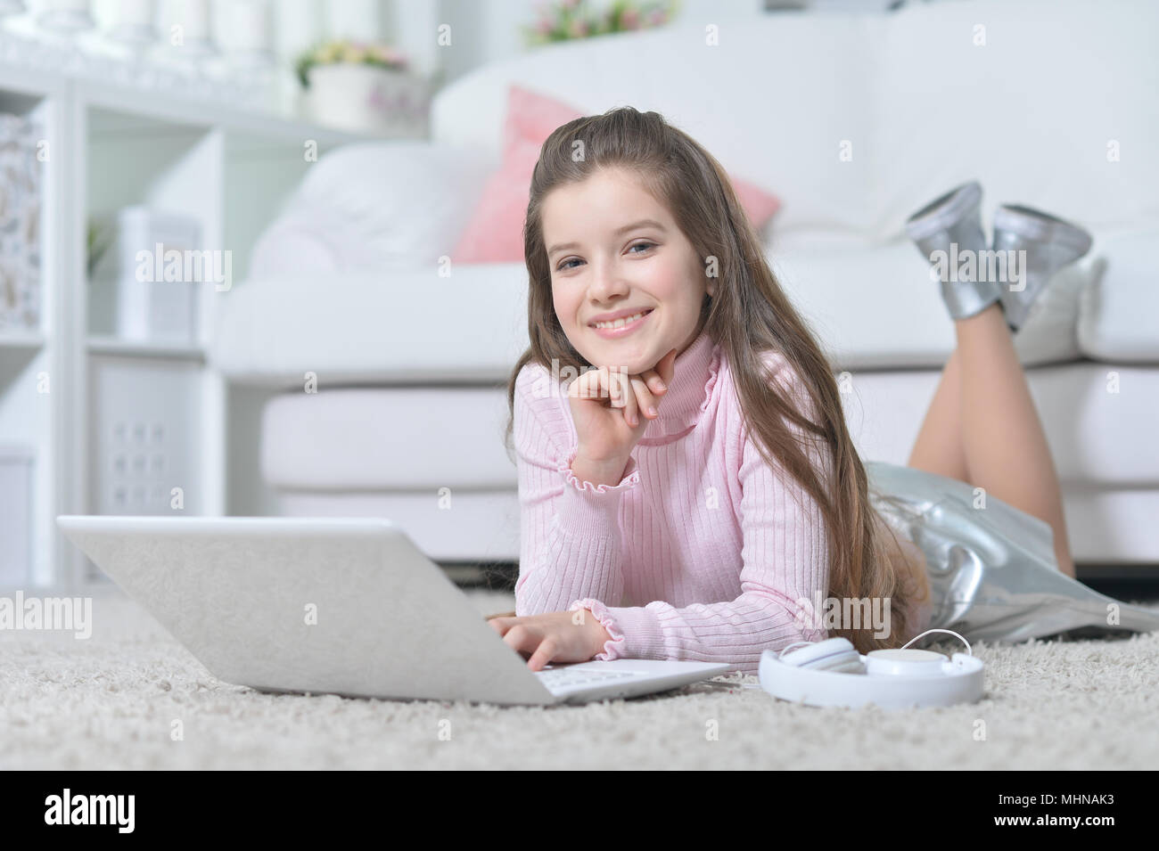 beautiful teen girl using laptop Stock Photo - Alamy