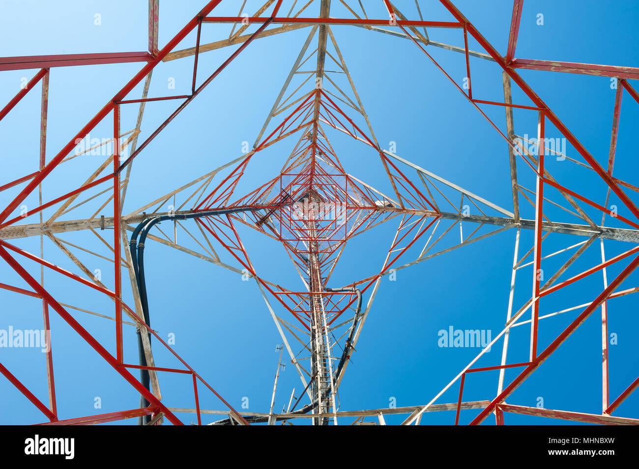 Giant antenna's pylon in front of Monastery at the top of Mount