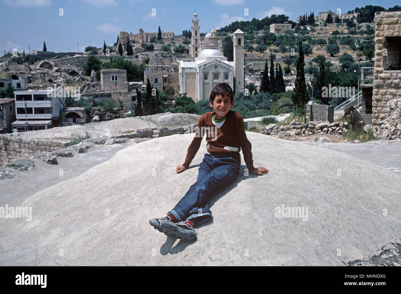 Palestinian boy in front of Lazarus Church, Nazareth, West bank, East Jerusalem, Israel