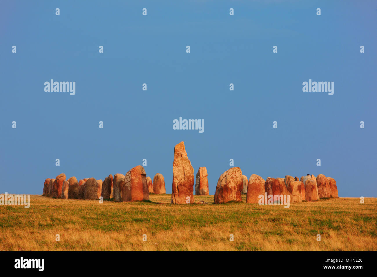 Ale stones (Ales stenar) is an anicient megalithic stone ship monument formed by 59 large boulders in the province of Scania in southern Sweden Stock Photo