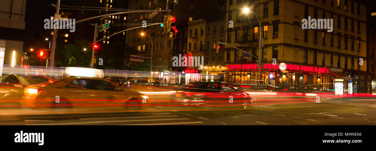 Night time traffic at the corner of 23rd St and 2nd Ave, manhattan, new york city Stock Photo