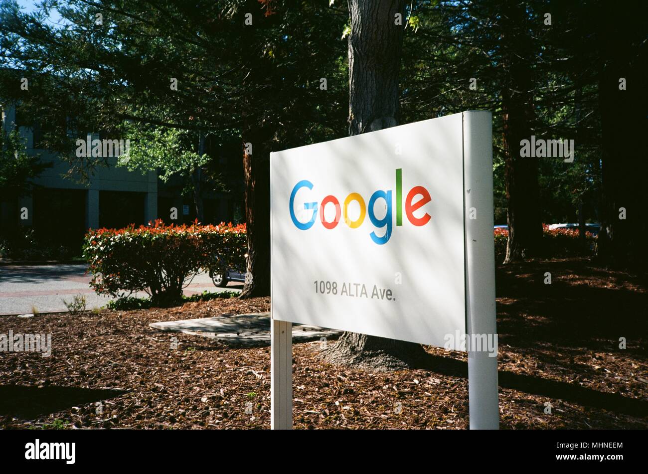 Sign with logo at entrance at the Googleplex, the Silicon Valley headquarters of search engine and technology company Google Inc in Mountain View, California, April 14, 2018. () Stock Photo