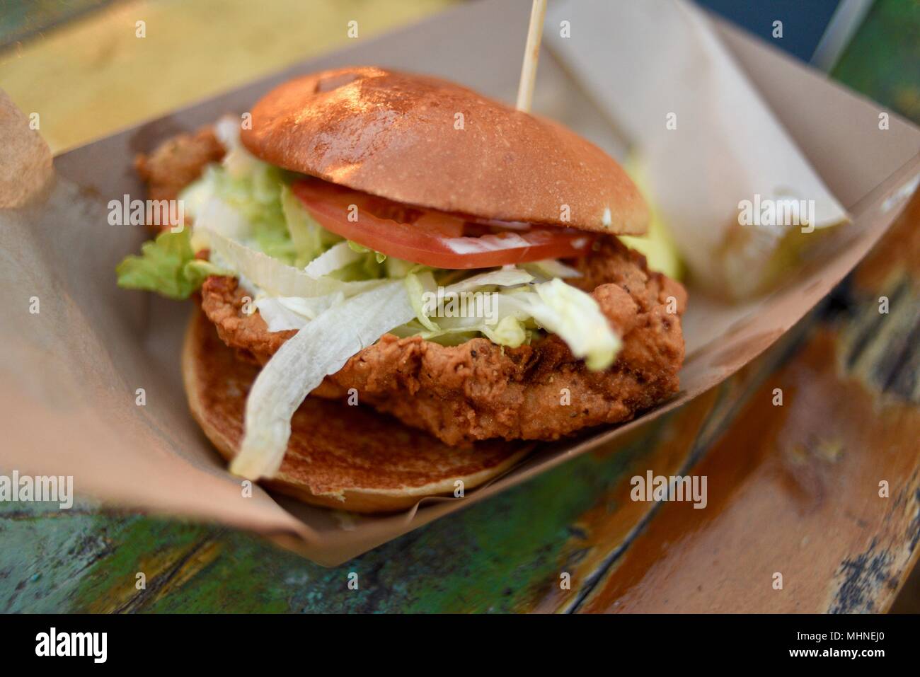 Fresh flounder sandwich with fried flounder, lettuce and tomato, local