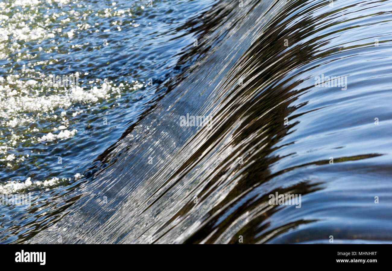 Close up Water flowing from the dam Stock Photo Alamy
