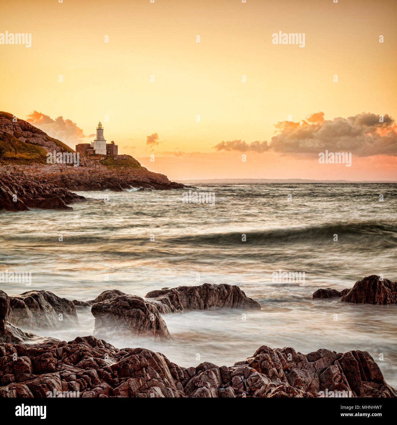 Dawn at Bracelet Bay on the Gower Peninsula, Soth Wales, UK. Stock Photo