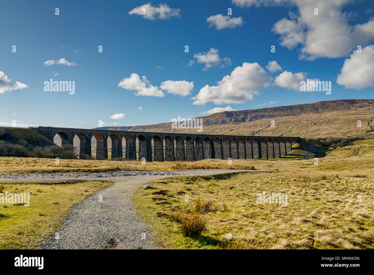 A distant view of the Ribblehead viaduct, on a sunny day Stock Photo
