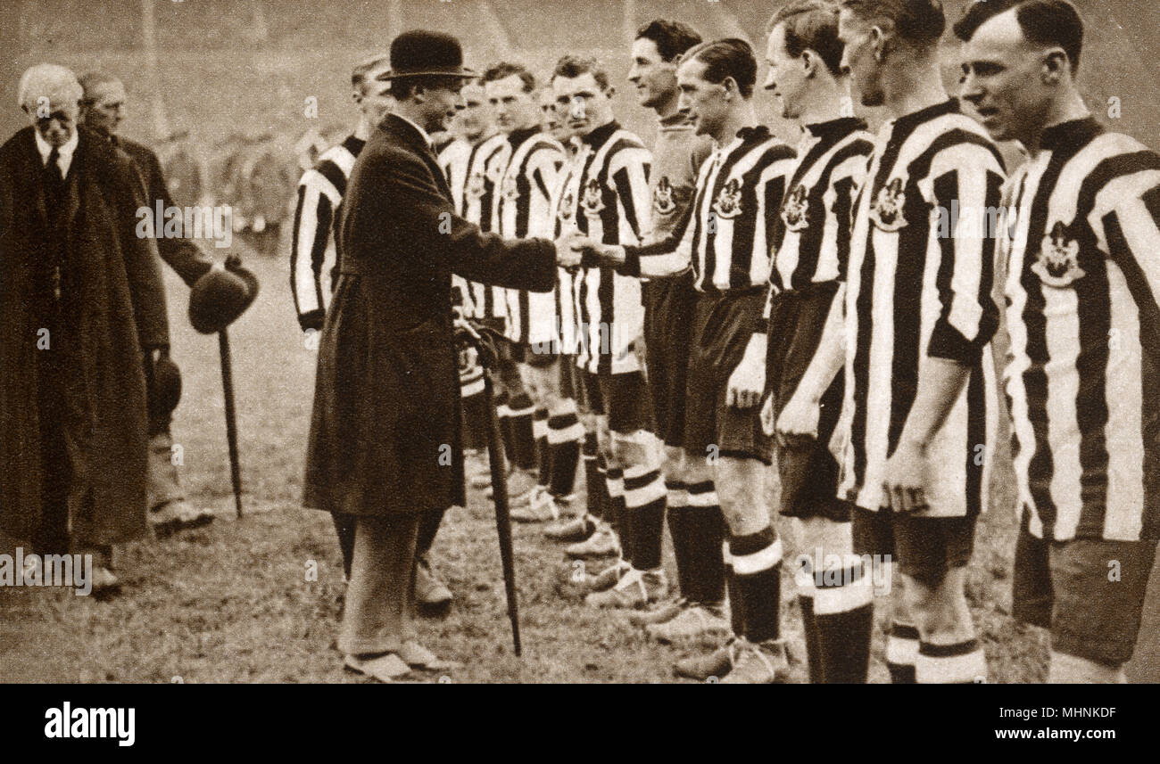 Albert, Duke of York (1895-1952) (later King George VI) -  shakes hand with the Newcastle United side before the FA Cup Final at Wembley Stadium (the second final held at the Stadium) before they took on (and defeated) Aston Villa.     Date: 1924 Stock Photo