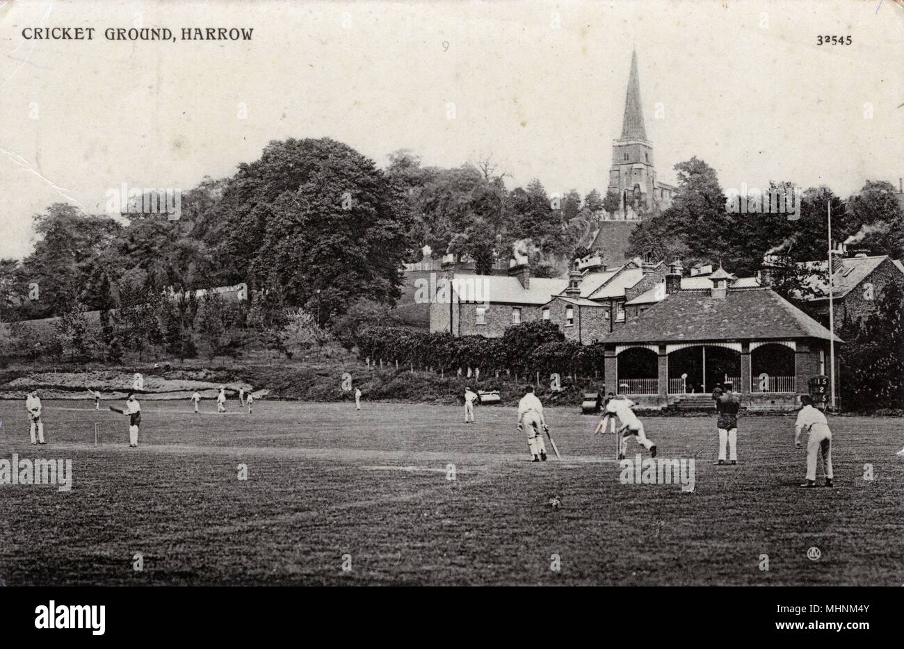 The Cricket Ground, Harrow School, Middlesex. Two games are being played simultaneously.     Date: circa 1906 Stock Photo