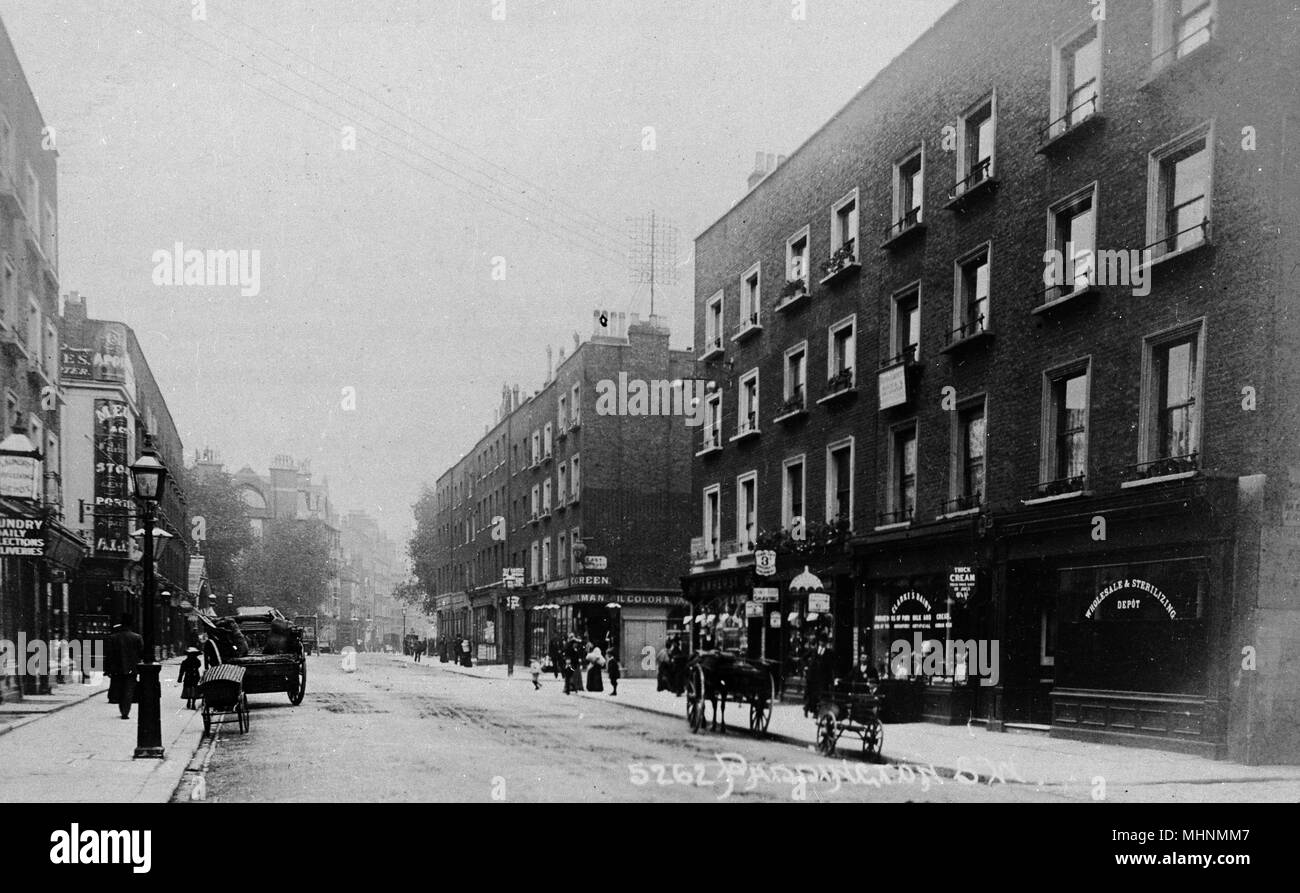 Paddington Street, looking from Baker Street, London, with the Apollo public house on the left, and the corner of East Street (now Chiltern Street) in the middle distance on the right.     Date: circa 1905 Stock Photo