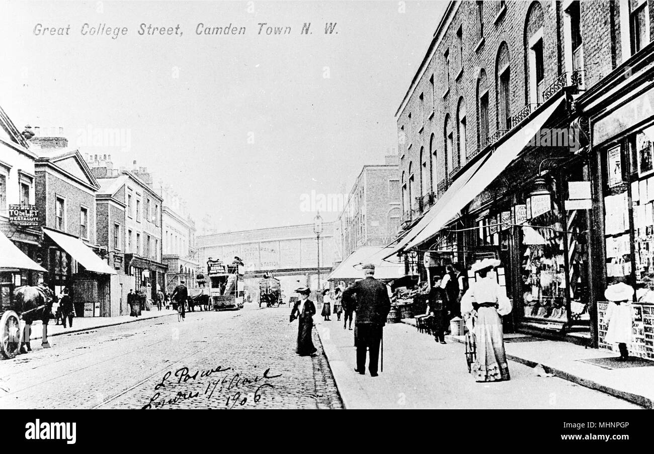 Great College Street, Camden Town, NW London, with the station bridge crossing above the road in the distance.       Date: circa 1905 Stock Photo