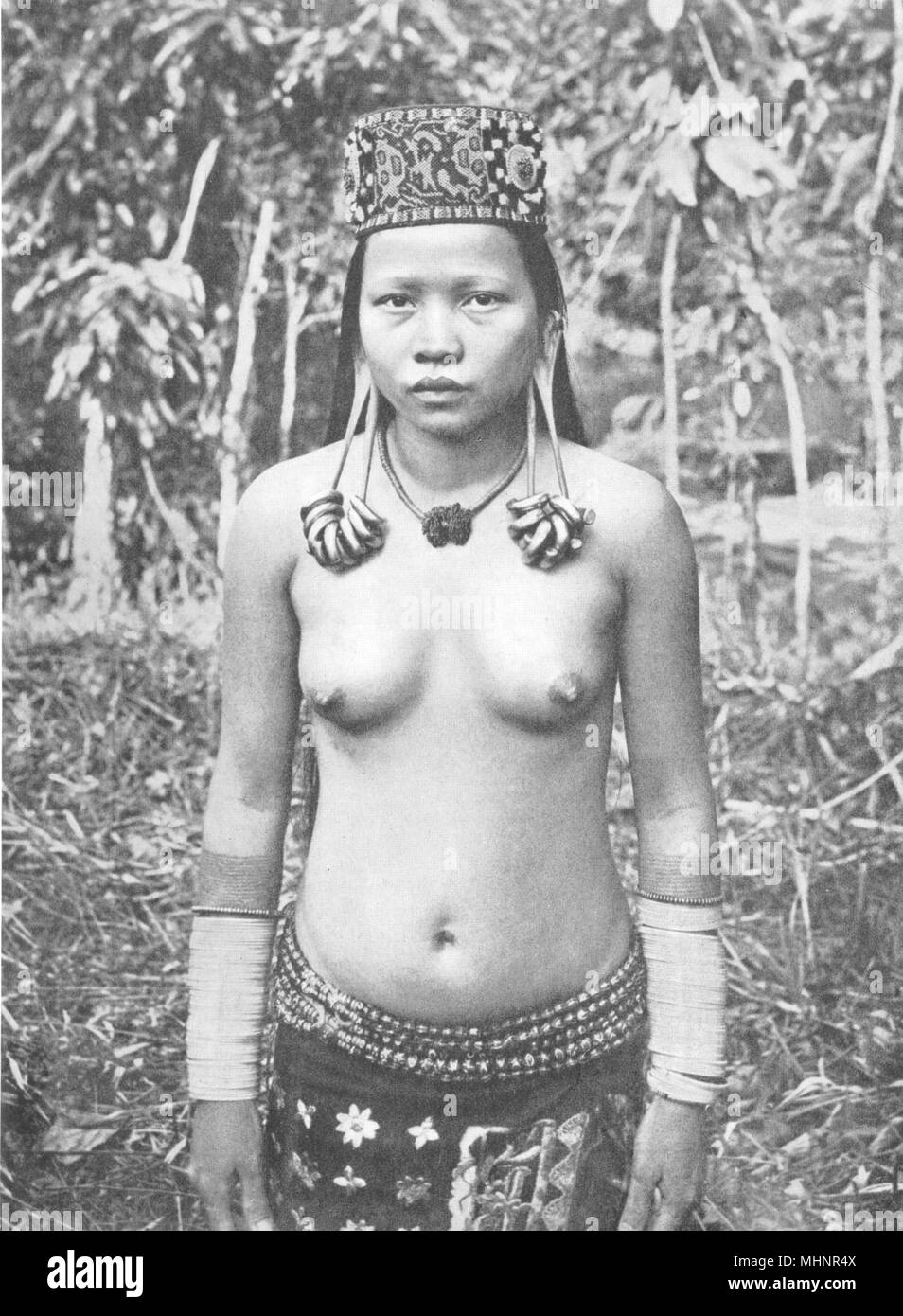 MALAYSIA. Borneo. Lirong woman distended Ear-lobes; Kayan Kenyah women 1900 Stock Photo