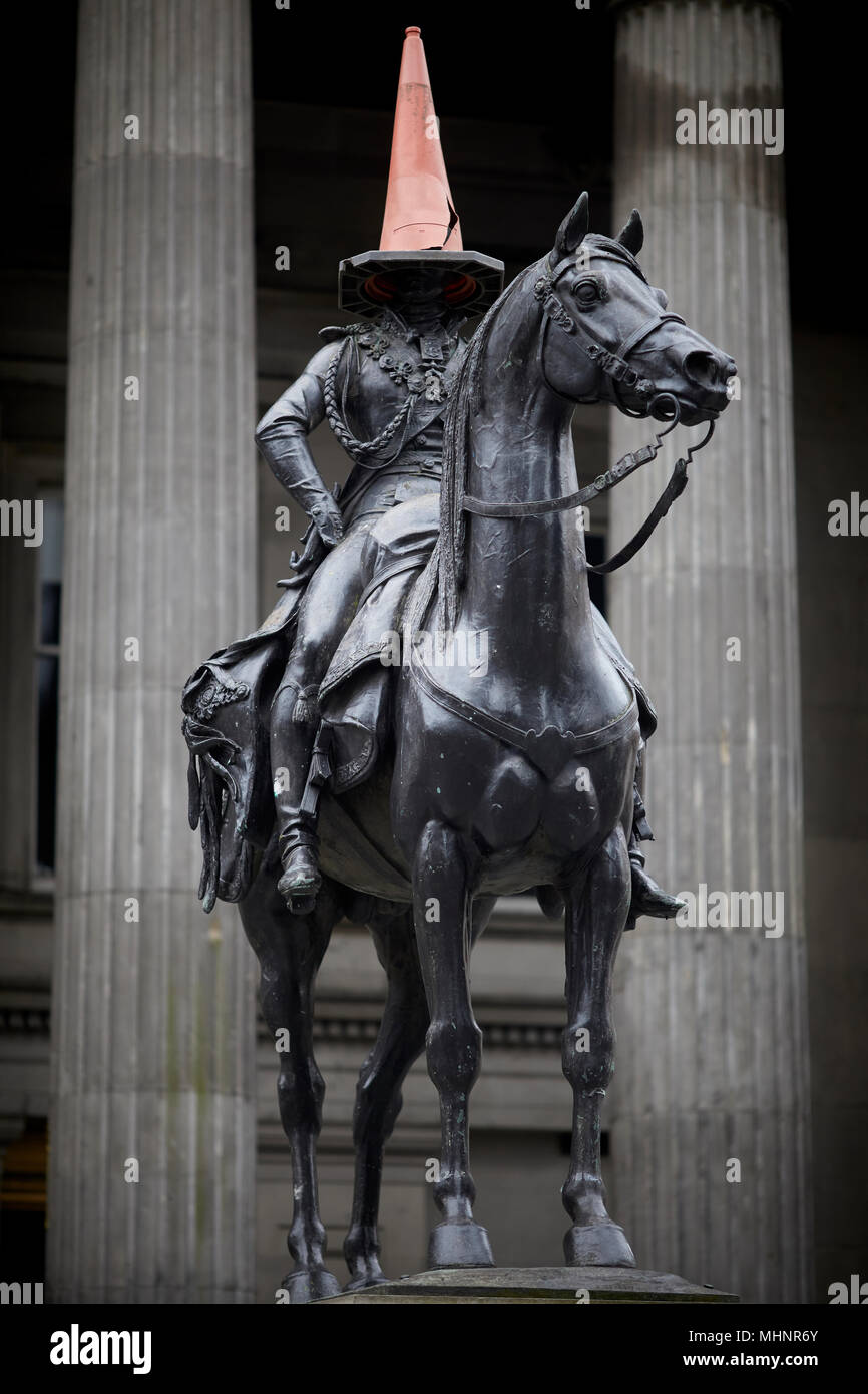 Glasgow in Scotland, Duke of Wellington statue has become an iconic landmark after a mysterious cone appeared Stock Photo